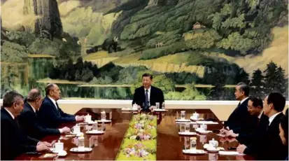  ?? RUSSIAN FOREIGN MINISTRY PRESS SERVICE VIA ASSOCIATED PRESS ?? On Tuesday, Russian Foreign Minister Sergey Lavrov (third from left) attended a meeting with Chinese President Xi Jinping (center) in Beijing.