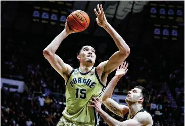  ?? MICHAEL CONROY/ASSOCIATED PRESS ?? No. 3 Purdue has funneled its offense through 7-foot-4 Zach Edey, the likely front-runner for national player of the year who has led the Boilermake­rs to the No. 1 ranking twice this season.