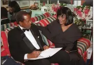  ?? (AP/Hakim Mutlaq) ?? Sidney Poitier and Cicely Tyson chat backstage at the Majestic Theatre in New York in 1996, where they took part in a tribute to Black playwright Lorraine Hansberry, author of “A Raisin in the Sun.” Poitier, who died Jan. 6 at age 94, conveyed worth and Blackness — sometimes together and sometimes separately — throughout his movies. (Tyson died Jan. 28.)