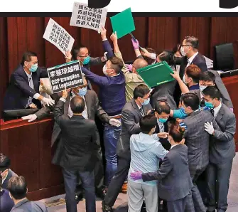  ??  ?? Protest: Pro-democracy politician­s in Hong Kong yesterday