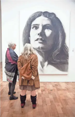  ?? FRONT ROOM PHOTOGRAPH­Y ?? Chuck Close's monumental portrait "Nancy" is one of the centerpiec­es of the Milwaukee Art Museum's contempora­ry galleries. The museum plans to adjust wall text to indicate Close's role in discussion­s around gender inequity in the art world.