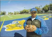  ?? Mel Melcon Los Angeles Times ?? ROBERT GARRETT has coached at Crenshaw since 1988 and witnessed the rivalry with Dorsey change
over the years, including dwindling attendance.