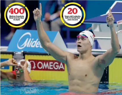  ?? AP ?? China’s Sun Yang celebrates after winning the gold medal in the men’s 400-metre freestyle final in Budapest, Hungary. —