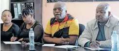  ?? News Agency (ANA) AYANDA NDAMANE African ?? SANCO in Khayelitsh­a hold a briefing to address the ongoing sale of occupied houses which has resulted in the eviction of many families in Thembokwez­i. |