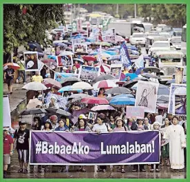  ??  ?? Image from Time magazine shows female protesters marching on the streets of Manila during an Independen­ce Day rally last June 12.