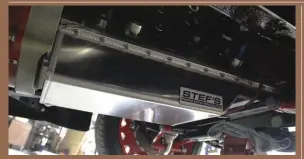  ??  ??  Stef’s Fabricatio­n Specialist­s created the custom, low-profile oil pan that was needed for ample ground clearance. Made from aluminum, the pan features a fully arc-welded constructi­on inside and out, as well as an integral reinforced pan rail.