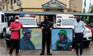  ??  ?? L-R: David Shonowo, volunteer, Slum Art Foundation; Tunji Disu, deputy commission­er of police,lagos State/commander, Rapid Response Squad, and Adetunwase Adenle, co-founder, Slumart Foundation, during the presentati­on of paintings done by Slum Art children in Ijora Badia in collaborat­ion with the RRS Team in Lagos.