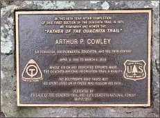  ?? (Special to the Democrat-Gazette/Danny Owens) ?? A memorial plaque for Arthur P. Cowley, the “father of the Ouachita Trail,” is located at the first section of the trail completed in 1971 in Oklahoma.
