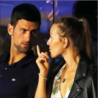  ?? (AP/Darko Vojinovic) ?? Novak Djokovic has tested positive for covid-19 after taking part in a tennis exhibition series he organized in Serbia and Croatia. The top-ranked Serb is the fourth player to test positive for the virus after first playing in Belgrade and then again last weekend in Zadar, Croatia. His wife, Jelena (right), also tested positive.
