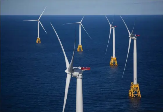  ?? BLOOMBERG FILE PHOTO ?? The Ontario Liberal government says it needs more informatio­n to decide if a ban on offshore wind projects similar to this wind farm in the U.S. should be lifted.