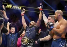  ?? AP photo ?? Jon Jones celebrates after defeating Ciryl Gane for the heavyweigh­t title at UFC 285 on Saturday.