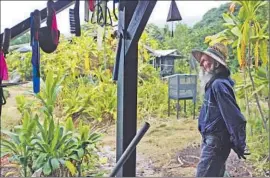  ?? Cathy Bussewitz
Associated Press ?? ORGANIC farmer Steve Mann won’t use pesticides because his farm would lose certif ication for three years. “That might well put us out of business,” he said.