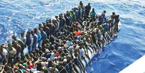  ?? AP ?? Migrants on a ship intercepte­d offshore by Libyan Coast Guard near the town of Gohneima, east of the capital, Tripoli. There were four boats, boarding 490 African migrants including 75 women and 21 children.