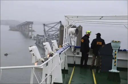  ?? PETER KNUDSON — NTSB VIA AP ?? National Transporta­tion and Safety Board investigat­ors work on the cargo vessel Dali, which struck and collapsed the Francis Scott Key Bridge on Wednesday in Baltimore. Federal and state officials have said the crash appeared to be an accident.