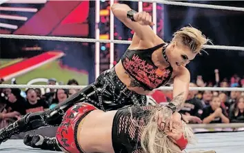  ?? | Bleacher Report ?? RHEA Ripley doing what she likes to do the most.