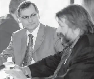  ?? Calgary Herald/files ?? Former municipal affairs minister Ray Danyluk, right, shown with Premier Ed Stelmach in 2007, says he went to Ottawa to get help and support after the floods of 2005, but was unsuccessf­ul.