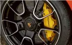  ??  ?? EQUIPMENT
Carbon-ceramic brakes with 10-piston calipers come as standard on the Turbo S. Porsche’s torque-vectoring tech is used on the rear axle to ensure that power is sent to where it can be most effectivel­y used