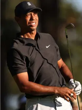  ?? HARRY HOW/AGENCE FRANCE-PRESSE ?? TIGER Woods extends his gratitude to his fellow golfers for their prayers and support.
