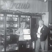  ?? Photo by Beth Koop ?? Ombudsman for Employer Support of the Guard and Reserve (ESGR), Eric Story presents Straub Brewery Vice President of Sales, Marketing and Public Relations, Cathy Lenze with the ESGR Patriot Award.