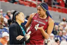  ?? Butch Dill/Associated Press ?? South Carolina head coach Dawn Staley talks with South Carolina forward Aliyah Boston during the second half against Auburn on Thursday in Auburn, Ala.