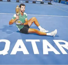  ?? ATP ?? Khachanov, con el trofeo de campeón en Doha //