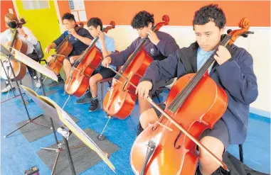  ?? Photo / Supplied ?? Youths from four schools are about to demonstrat­e their new string instrument skills.