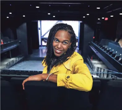  ??  ?? Crosstown Arts theater director Jazmin “Jazzy” Miller sits in a new multi-use theater at Crosstown Concourse. MARK WEBER / THE COMMERCIAL APPEAL