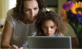  ??  ?? ‘Parents don’t talk about the joy of screens’ (posed by models). Photograph: Inti St Clair/Getty Images/Blend Images