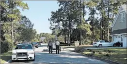  ?? JEFFREY S. COLLINS/AP ?? Police patrol the area of Wednesday’s fatal shooting on Thursday in Florence, S.C.