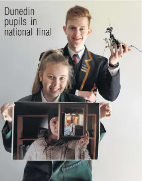  ?? PHOTO: STEPHEN JAQUIERY ?? Exhibiting talent ...John McGlashan College pupil Tim Scott (17) and Columba College pupil Samantha Smith (16) hold works which landed them among the finalists in the Wallace Secondary School Art Awards.