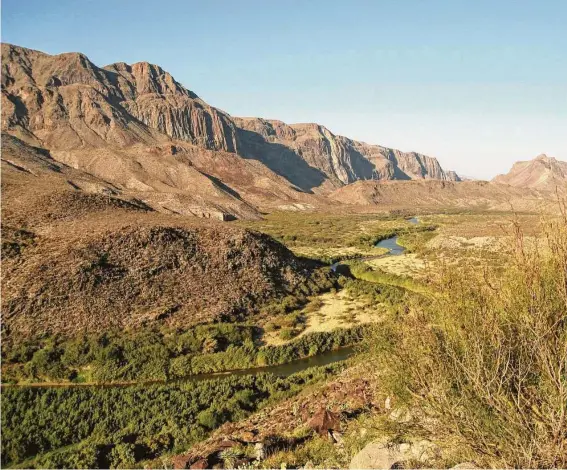  ?? Staff file photo ?? Mountains of Mexico rise south of the Rio Grande, locally called the Rio Bravo, and Big Bend Ranch State Park. Ranch Road 170 forms the park’s southern line.