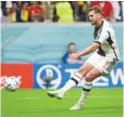  ?? ?? Niclas Fuellkrug hits Germany’s equaliser to earn a point in their clash with Spain.