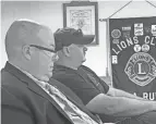  ?? MITCH HOOPER ?? Scioto Valley Fire Chief Paul Kerr (black hat) sits with his defense attorney Porter Welch as the Scioto Valley Fire Board advised Kerr would be placed on a 30-day paid suspension after refusing to respond to a structure fire on Seiter Road on Easter morning.