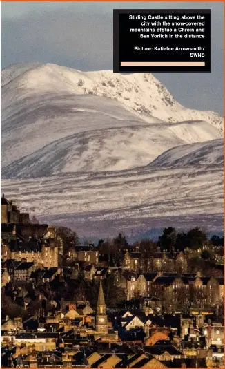  ?? ?? Stirling Castle sitting above the city with the snow-covered mountains ofStuc a Chroin and Ben Vorlich in the distance
Picture: Katielee Arrowsmith/ SWNS