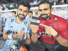  ?? GETTY ?? Manpreet Singh (left) will lead the side and goalkeeper PR Sreejesh has made a comeback into the India squad for the CWG.