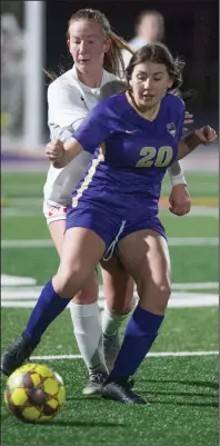  ?? BEA AHBECK/NEWS-SENTINEL ?? Lodi’s Chloe Nowak and Tokay’s Madeleine Garcia fight for control of the ball during their game at Hubbard Field on Tuesday.