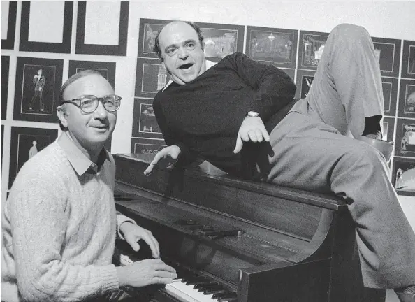  ?? THE ASSOCIATED PRESS ?? Playwright Neil Simon, left, and actor James Coco worked together in 1981 on the musical comedy Little Me. Simon’s plays dominated Broadway for decades and during one seven-month stretch in 1967, he had four production­s running on Broadway at the same time.