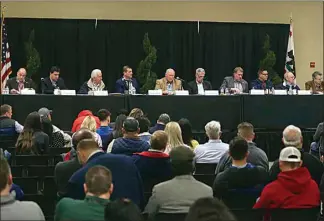  ?? ELIZA GREEN / THE CALIFORNIA­N ?? A panel of congressme­n line the front table during a listening session at the World Ag Expo where representa­tives from various industries were able to share elements they would like included in the upcoming Farm Bill.