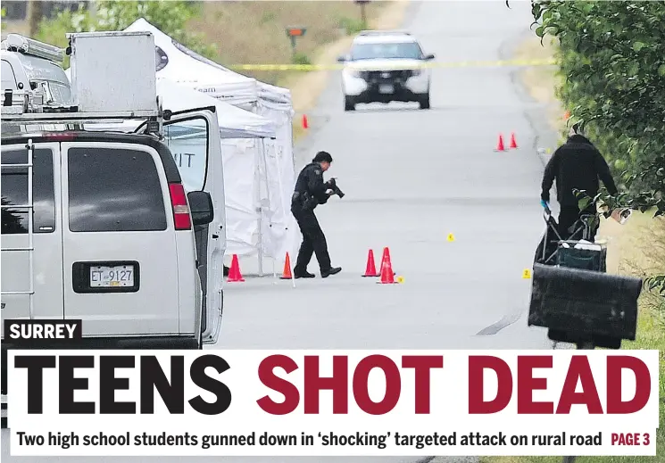  ?? NICK PROCAYLO/PNG ?? Homicide investigat­ors gather evidence Tuesday in the 18800-block 40th Avenue in Surrey, where two teen boys were found with fatal gunshot wounds.