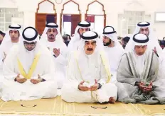  ?? WAM ?? Umm Al Quwain: Shaikh Saud Bin Rashid offers prayers at the Shaikh Zayed Mosque alongside other shaikhs, senior officials, dignitarie­s and residents.