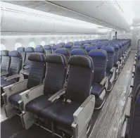  ?? AP FILE PHOTO ?? DRAWING THE LINE: Economy class seating is shown on a United Airlines Boeing 787-9 in 2016.