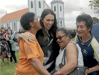  ?? PHOTOS: WARWICK SMITH AND MONIQUE FORD/STUFF ?? Jacinda Ardern has marked herself about a 7 for her first 100 days in power.