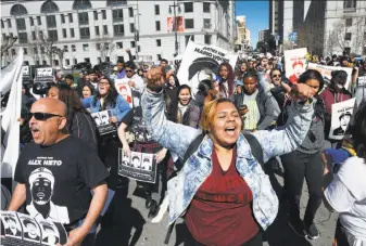  ?? Paul Chinn / The Chronicle 2016 ?? Faleula Linu (right) leads marchers demanding justice for Alex Nieto in San Francisco on March 1, 2016. Four police officers shot and killed Nieto in Bernal Heights Park.