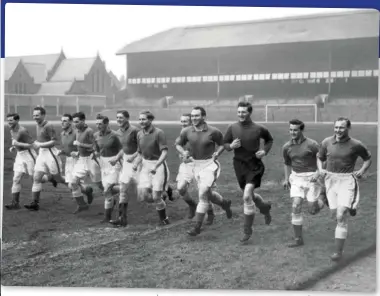  ??  ?? Above: Everton train at Goodison Park in preparatio­n for an FA Cup tie against Liverpool on 29 January 1955. George is second from the right Inset: George received this medal while playing for Everton in 1954