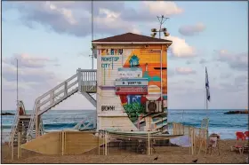  ?? (AP/Oded Balilty) ?? A lifeguard station is seen Aug. 17 on the Mediterran­ean Sea beachfront in Tel Aviv, Israel.