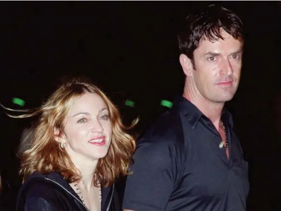  ??  ?? Rupert Everett with some sweaty barmaid (allegedly) at an event in 1999