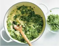  ?? ?? Spinach, scallions and cilantro add heft to a coconut milk-infused rice.