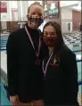  ?? CHRIS LILLSTRUNG — THE NEWSHERALD ?? Chagrin Falls’ Samantha Holtz, left, and Kate LaMonica took third and second, respective­ly, during the Division II girls state diving meet Feb. 24.