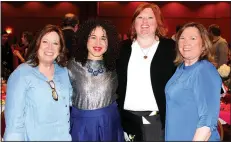  ?? NWA Democrat-Gazette/CARIN SCHOPPMEYE­R ?? Meka Cox, Saving Grace alumna (second from left), is joined by Belinda Tyler (from left), Jacci Zaerr and Stephanie Falge at the Butterflie­s and Blooms benefit April 19 at the John Q. Hammons Center in Rogers.