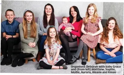  ?? Picture:MURRAYSAND­ERS ?? Organised: Deborah with baby Grace and (from left) Matthew, Sophie, Mollie, Aurora, Aleana and Kinsie